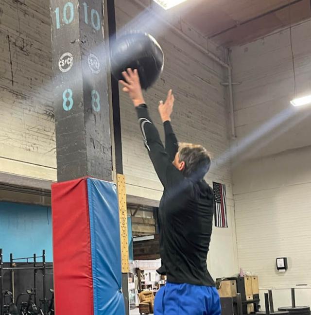 athlete doing wall ball